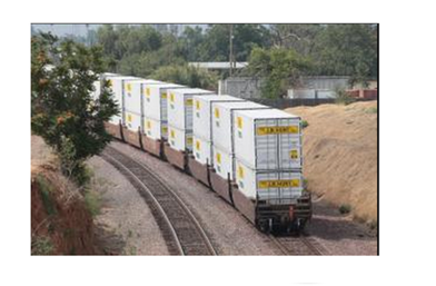 A train carrying two layers of containers to overcome the increase container supply. Source: Shacklett (2014)