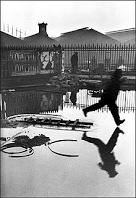 One of Bresson’s famous photographs called Behind the Gare St. Lazare.