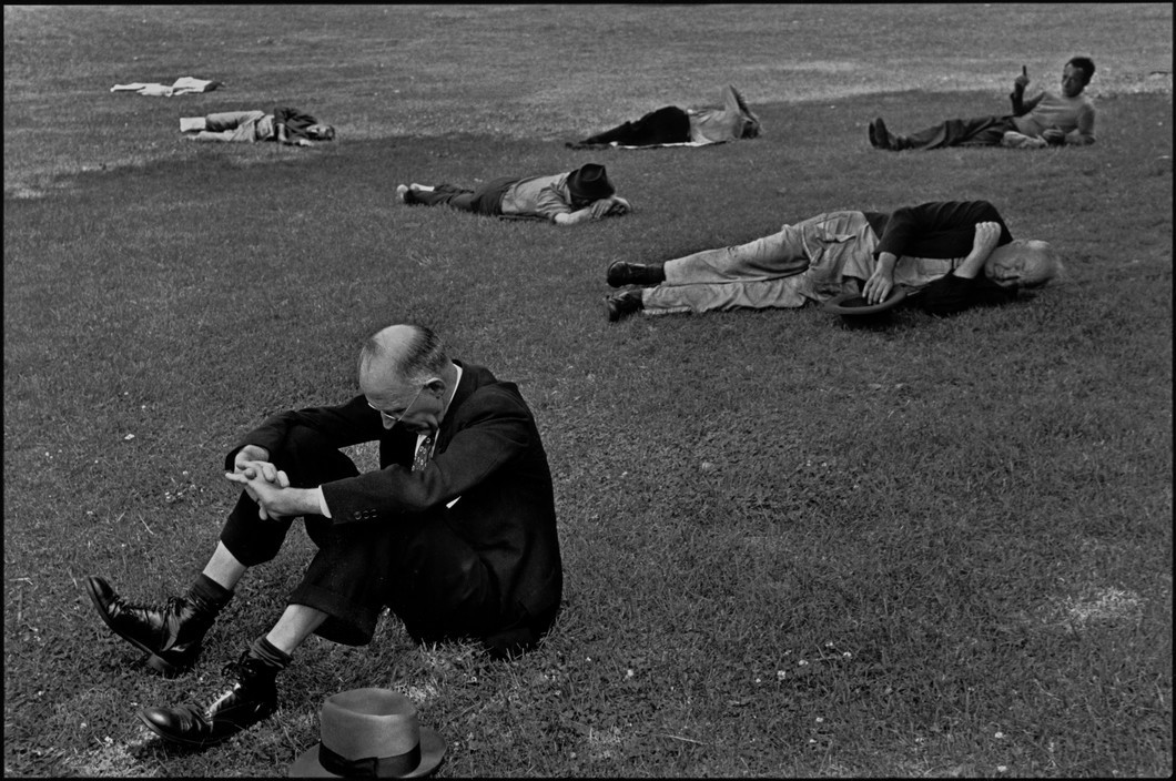Men Laying on Grass by Henri Cartier-Bresson