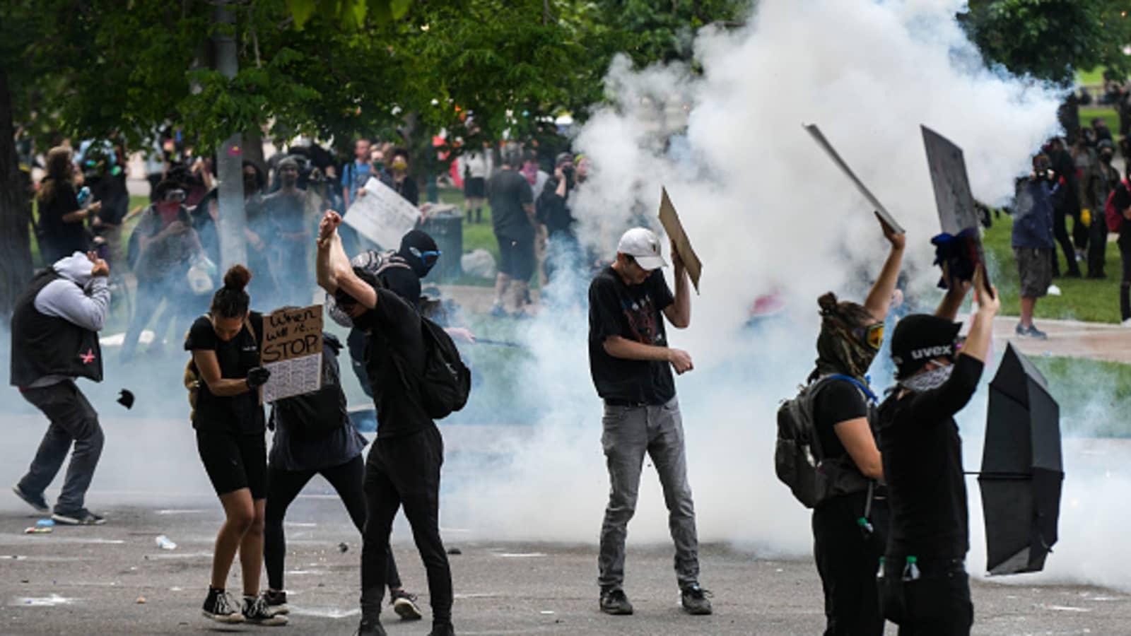 People as protests against the death of George Floyd on May 30, 2020, in Denver, Colorado (Lewis)