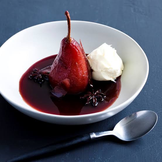 Poached pears in red wine with a vanilla cream