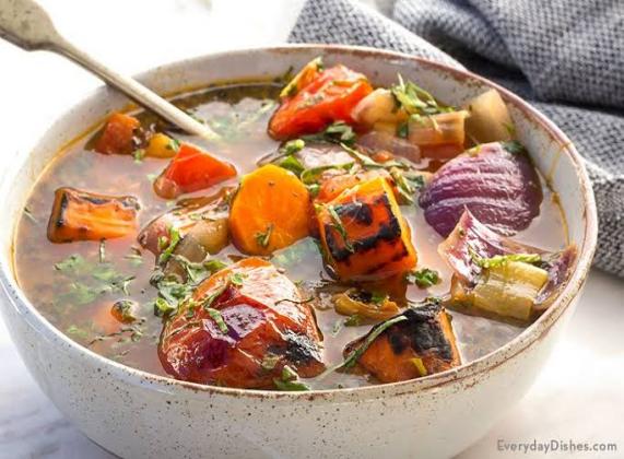 Grilled vegetable and herb broth