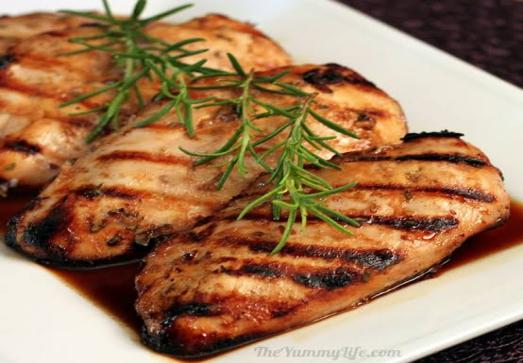 Grilled chicken breast with a rosemary and garlic marinade