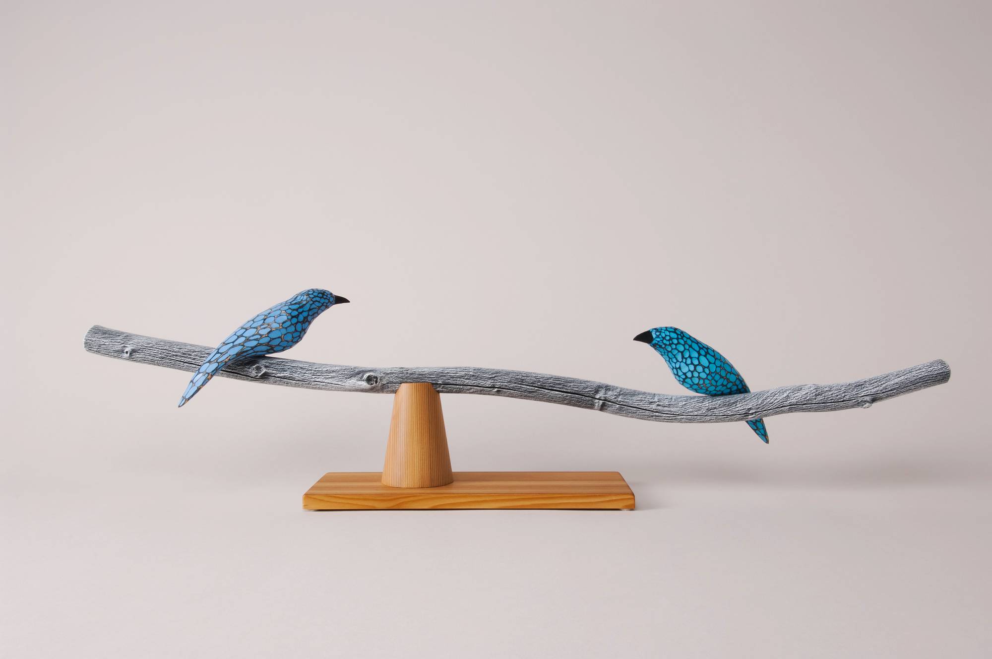 Blue birds on branch