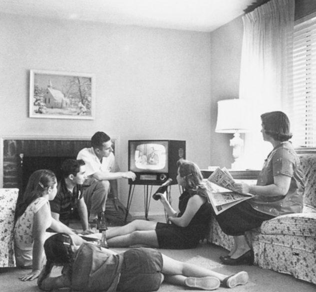 American family watching TV
