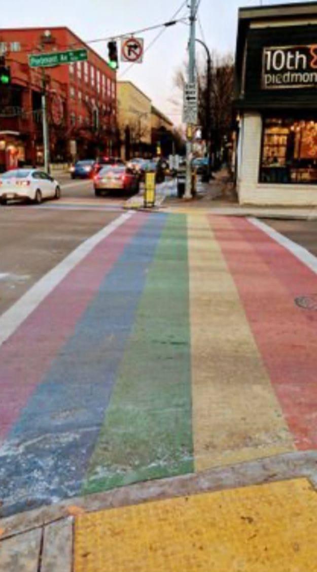 A pedestrian crossing in the LGBT flag's colors.